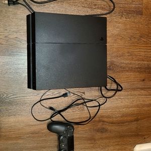 PS4 with Controller/ charger and HDMI cable, 3 PS4 games